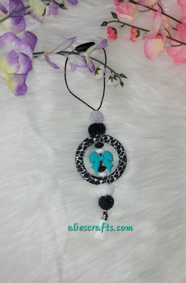 Turquoise bow cow theme car charm