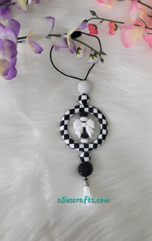 Checkered bow car charm