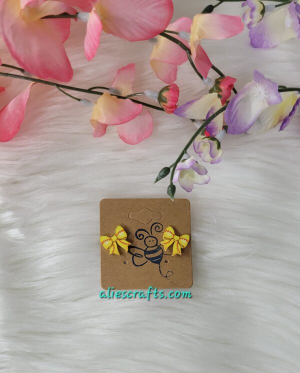 Yellow softball bow earrings