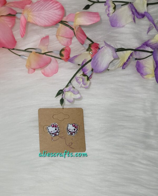 Hello kitty winky face earrings