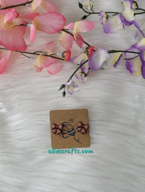 Football bow earrings