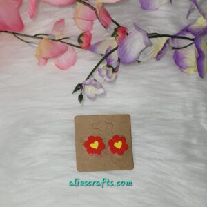 Red flower with yellow heart earrings