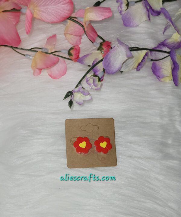 Red flower with yellow heart earrings