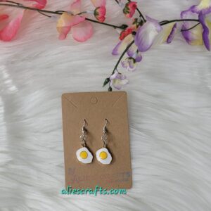 Egg charm earrings