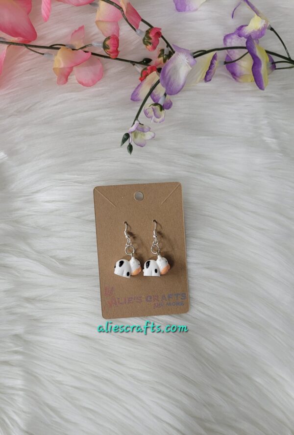 3d cow charm earrings