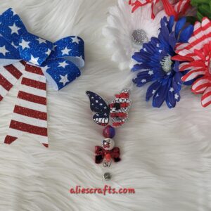 Butterfly flag badge