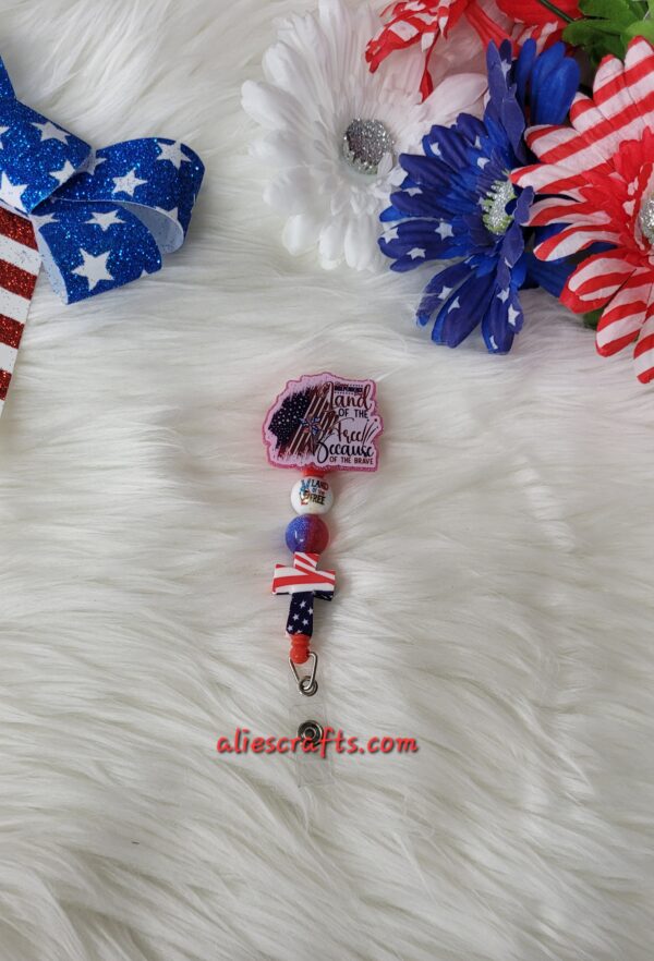 Land of the free because of the brave badge