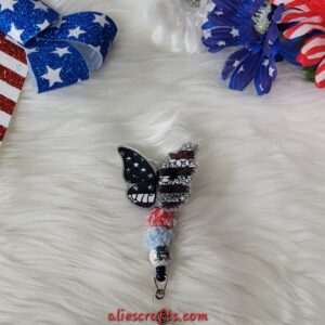 Flag butterfly badge