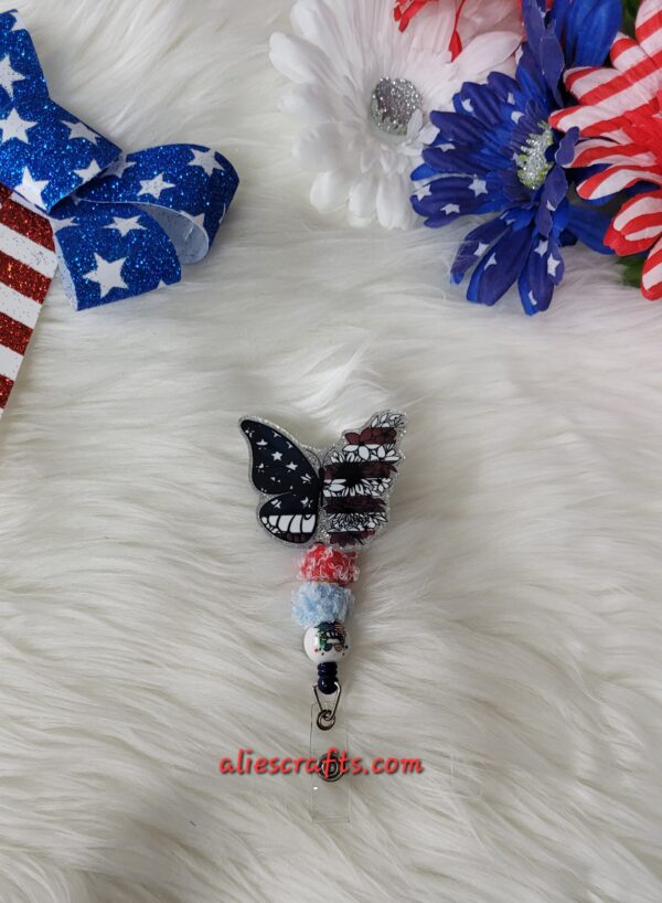 Flag butterfly badge