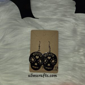 20250727_164303 Black glitter skull earrings