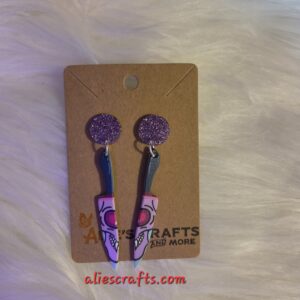 Skull knife earrings with purple post