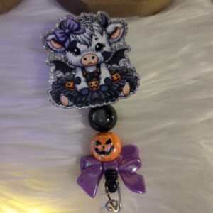 20250817_155421 Halloween addorable cow badge