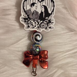 Morticia and Gomez Addams badge
