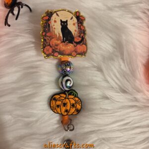 Autumn black cat badge