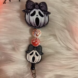 Ghostface pumpkin badge