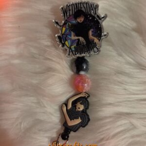 Dancing Wendesday badge