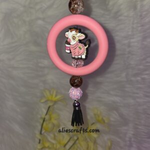 Cow with coffee car charm