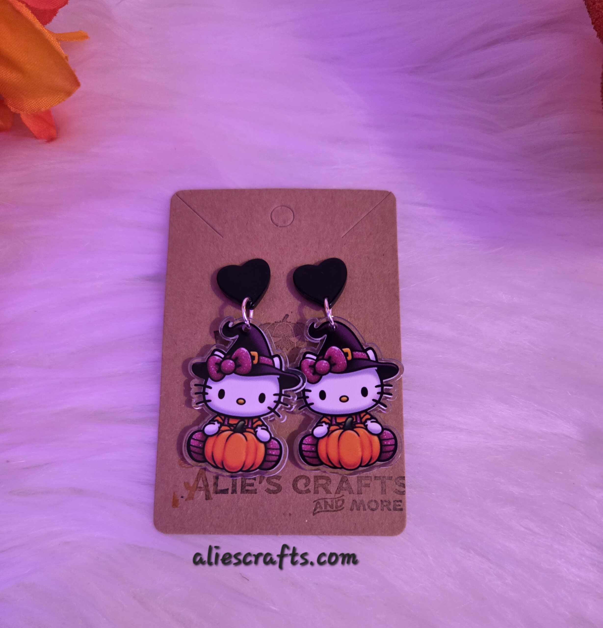 Hello kitty as a witch earrings