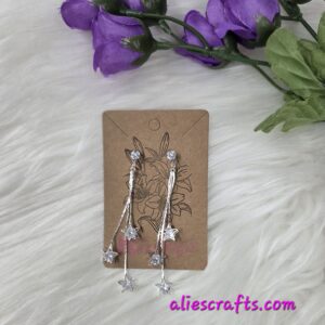 Clear star dangle earrings