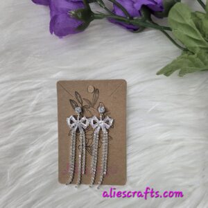 Clear bow rhinestone dangle earrings