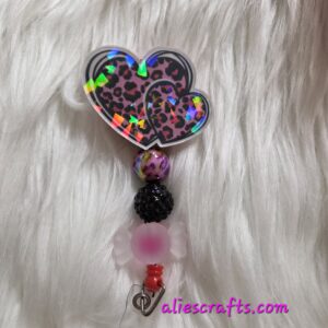 20260104_192852 Leopard print pink heart holographic badge