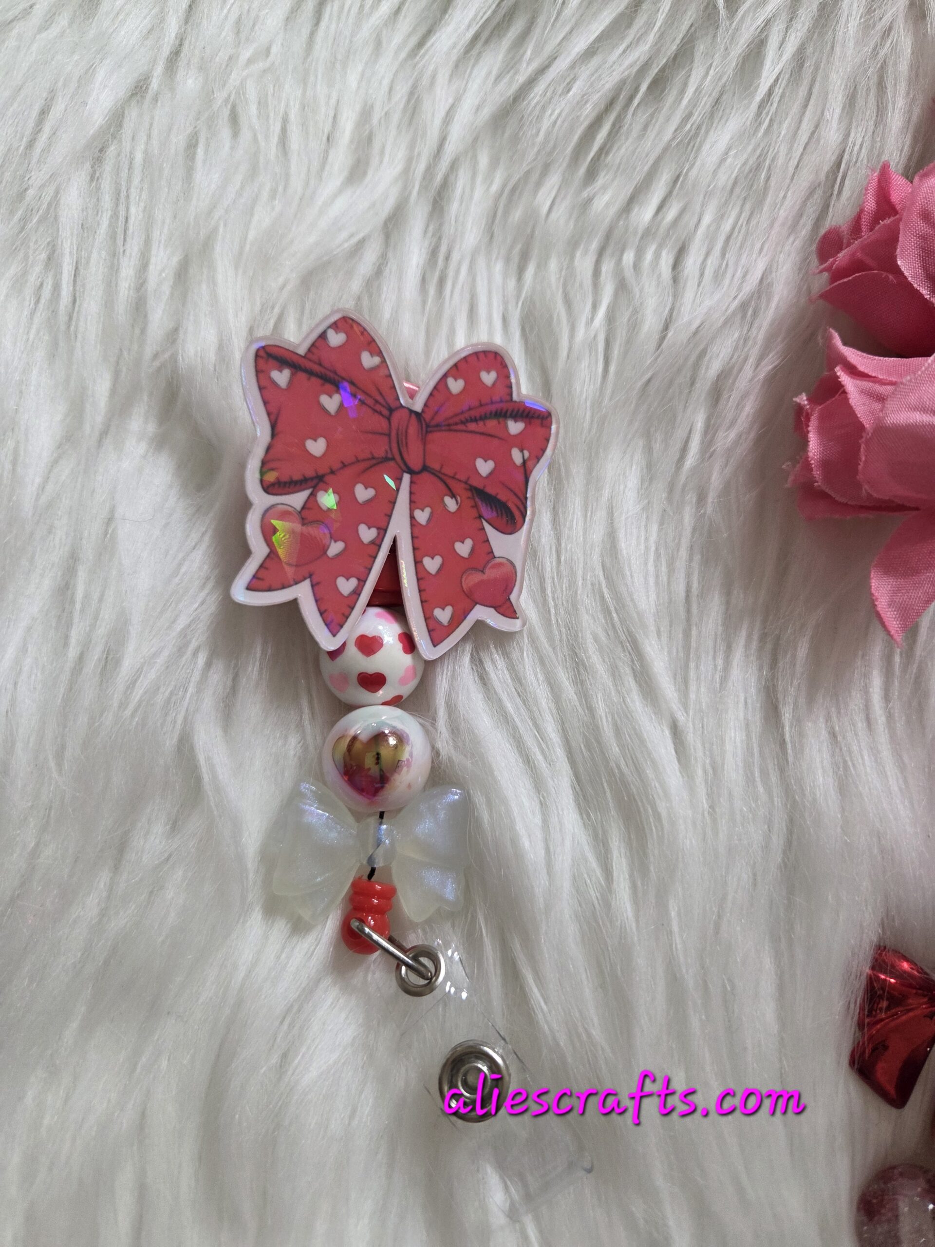 Red bow holographic badge reel - Image 3