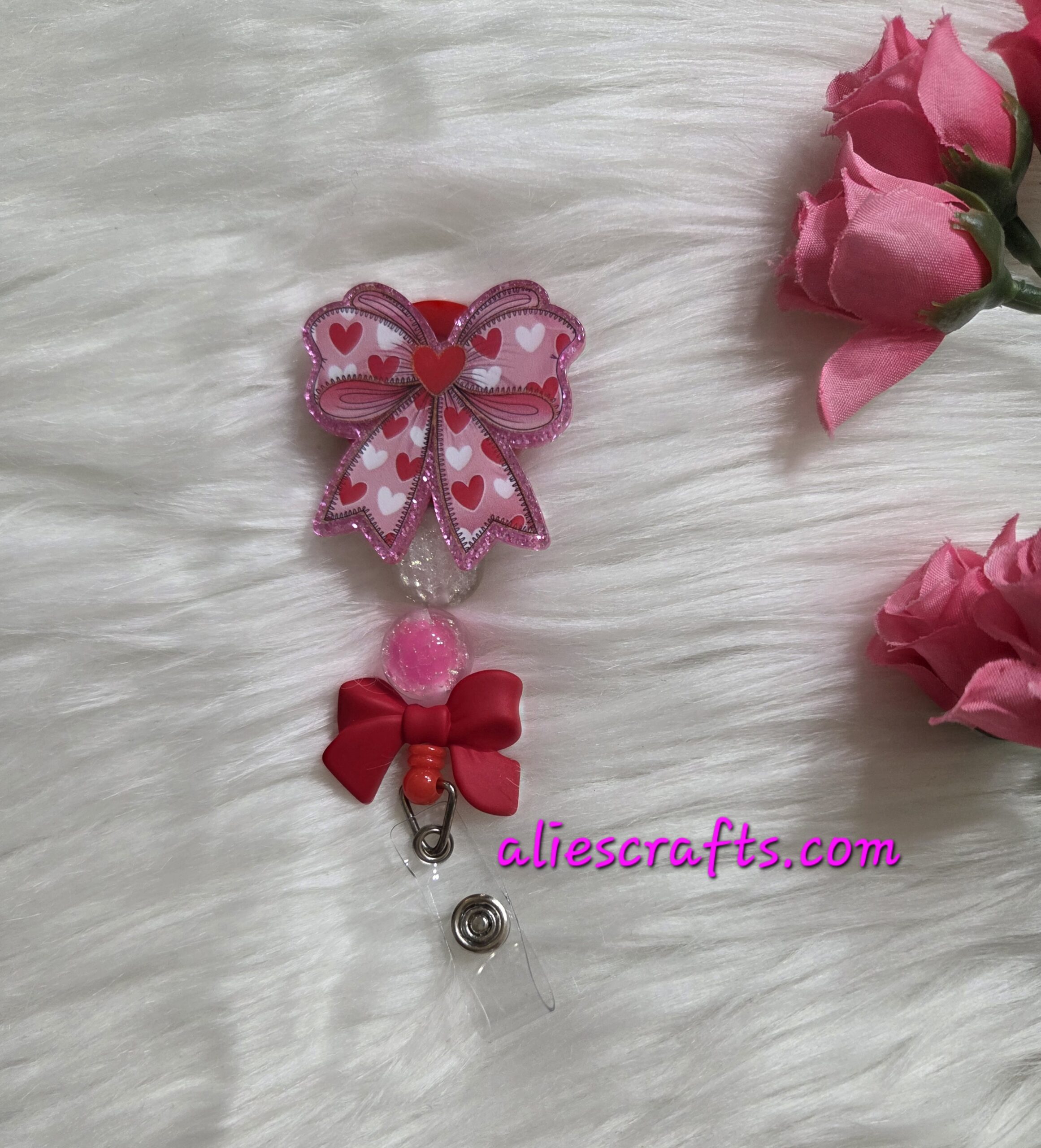 Bow badge reel