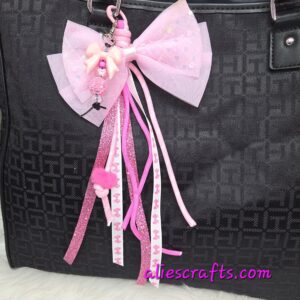 20260202_095606 Sparkly pink bow purse charm